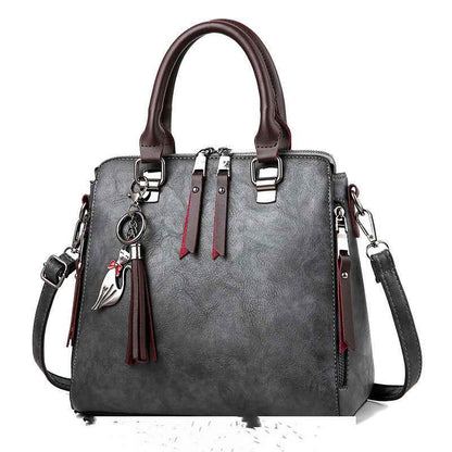 Sac à main vintage femme en cuir PU avec pampilles