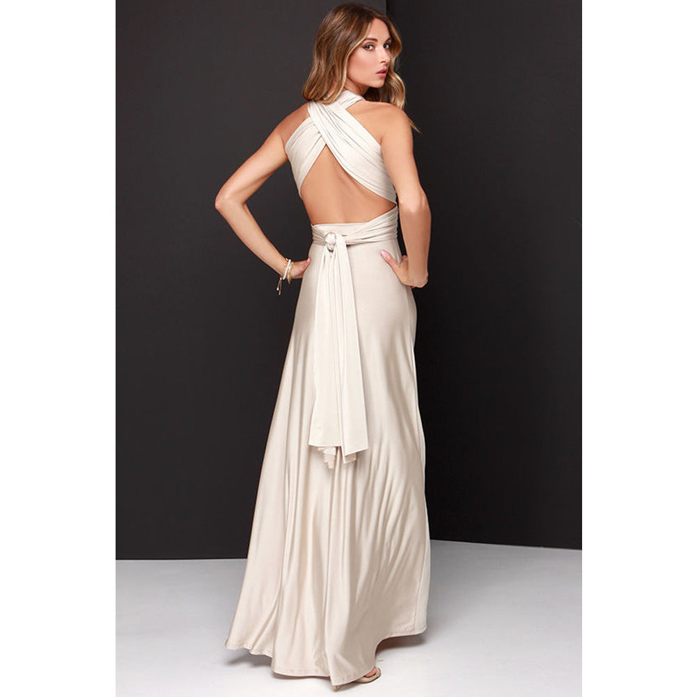 Glamuroso vestido con múltiples tirantes y espalda descubierta: elegancia escultural.