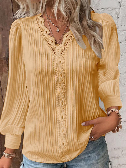 Chemise à manches longues avec col en V en dentelle